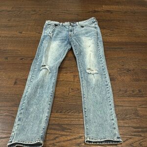 Men's Distressed Light Blue Jeans